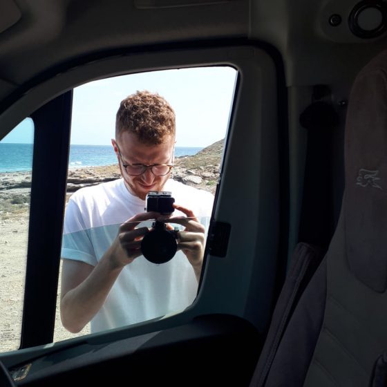 Luke securing the Go Pro on the motorhome window