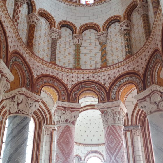 Striking painted columns in St Pierre church