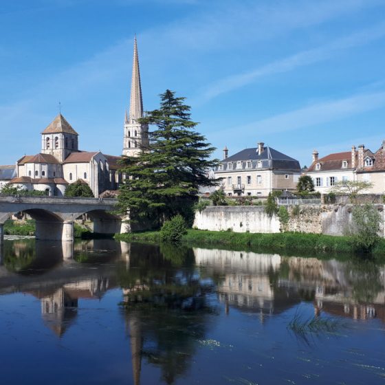 Beautiful reflections in St Savin's Gartempe river