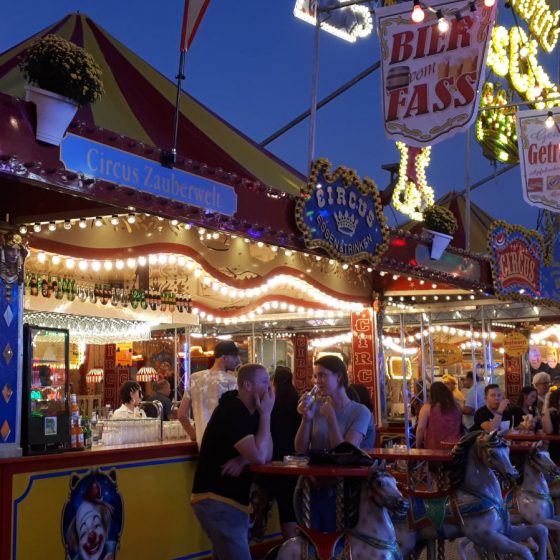 Fun carousel tables at this food stand.