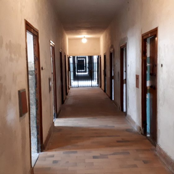 An interior corridor leading to rooms for 'special' prisoners