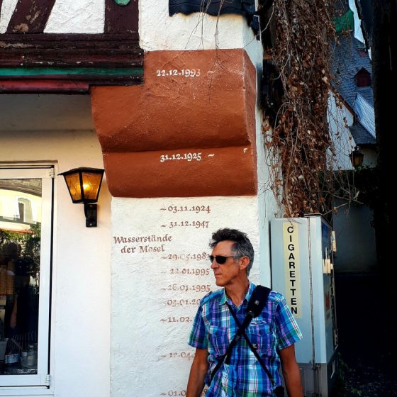 Markers on the wall showing incredibly high river levels in the past