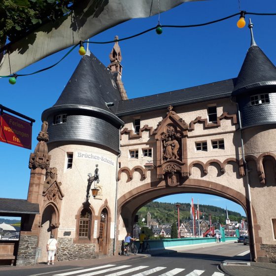 Traben Trarbach old town gate leading to the bridge over the river