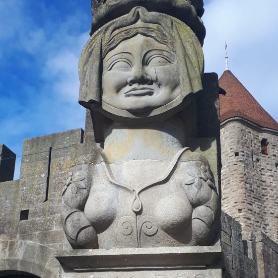 Carcassonne statue and UNESCO inscription