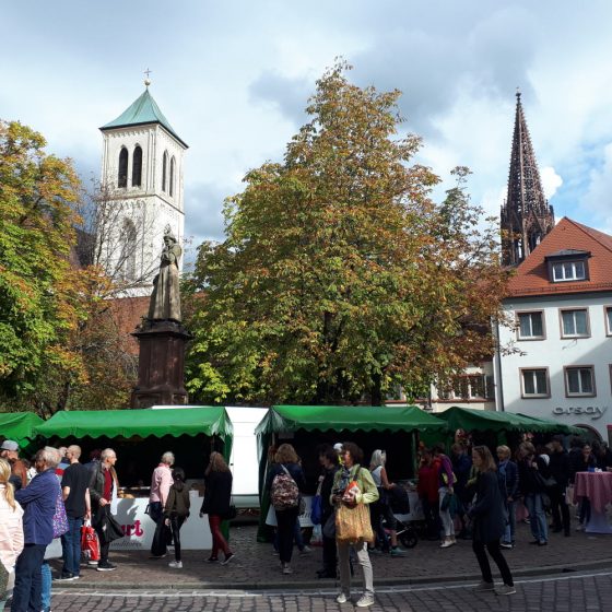 The busy market in Frieburg selling tasty Bretzels amongst other things
