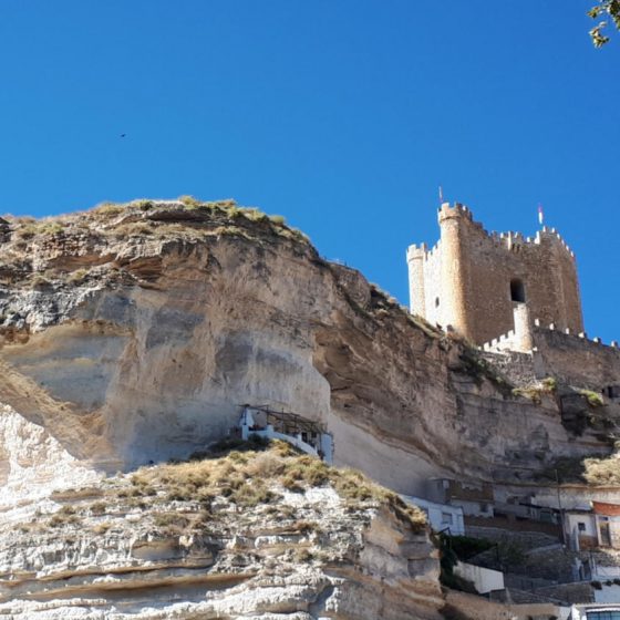 The restored castle perched on the Alcala del Jucar cliff top