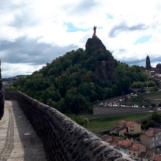 The statue of the Virgin Mary on a volcanic cone