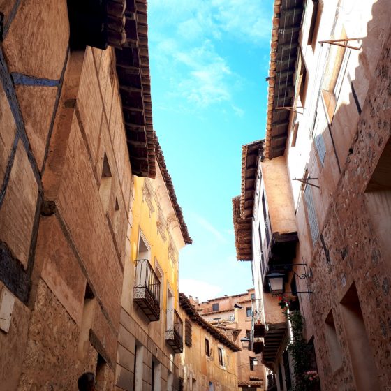 Looking up to the roof tops