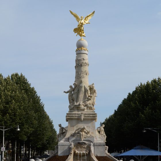 Reim column topped with golden sculpture